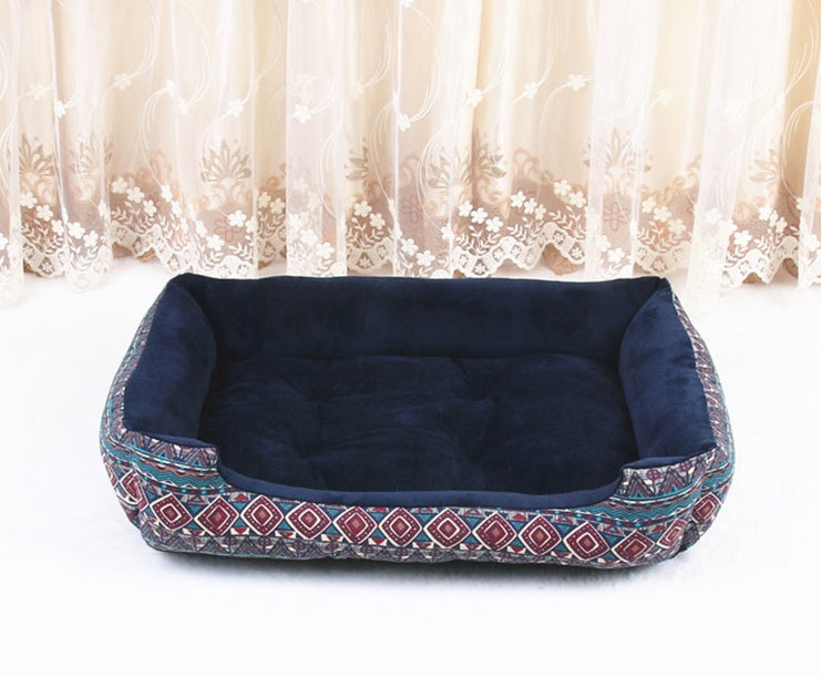 Cozy Teddy cat litter bed in navy blue with patterned edges, perfect for pets to relax and sleep comfortably.